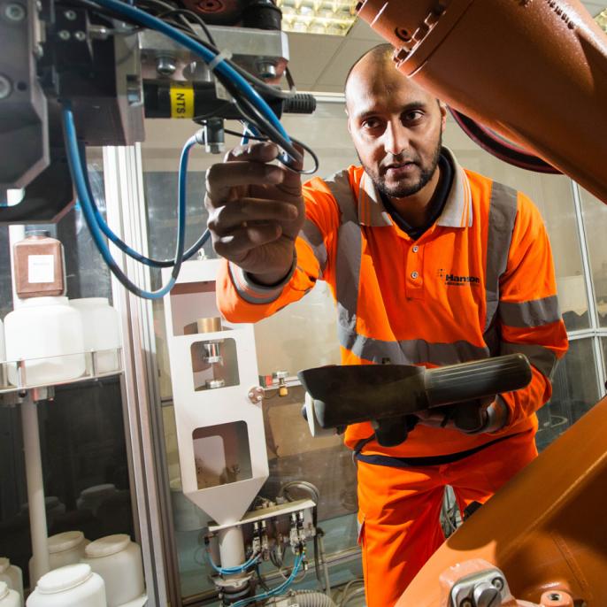 Quality technician Rasheed Firfire examining samples.. 